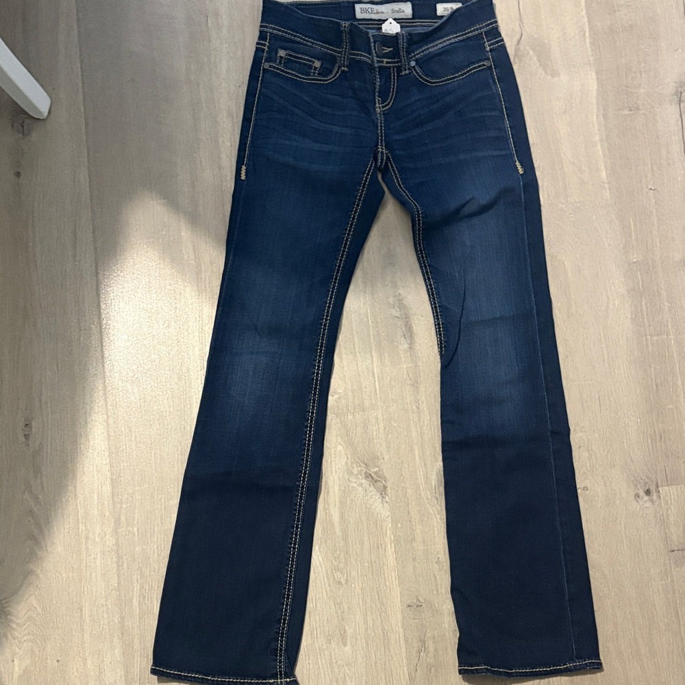 Women’s boot cut buckle jeans